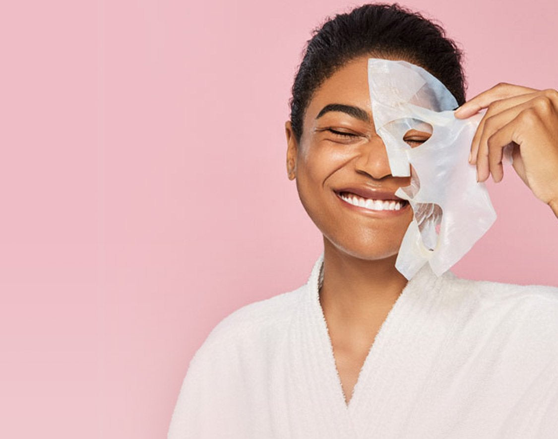 Women peeling off her face mask