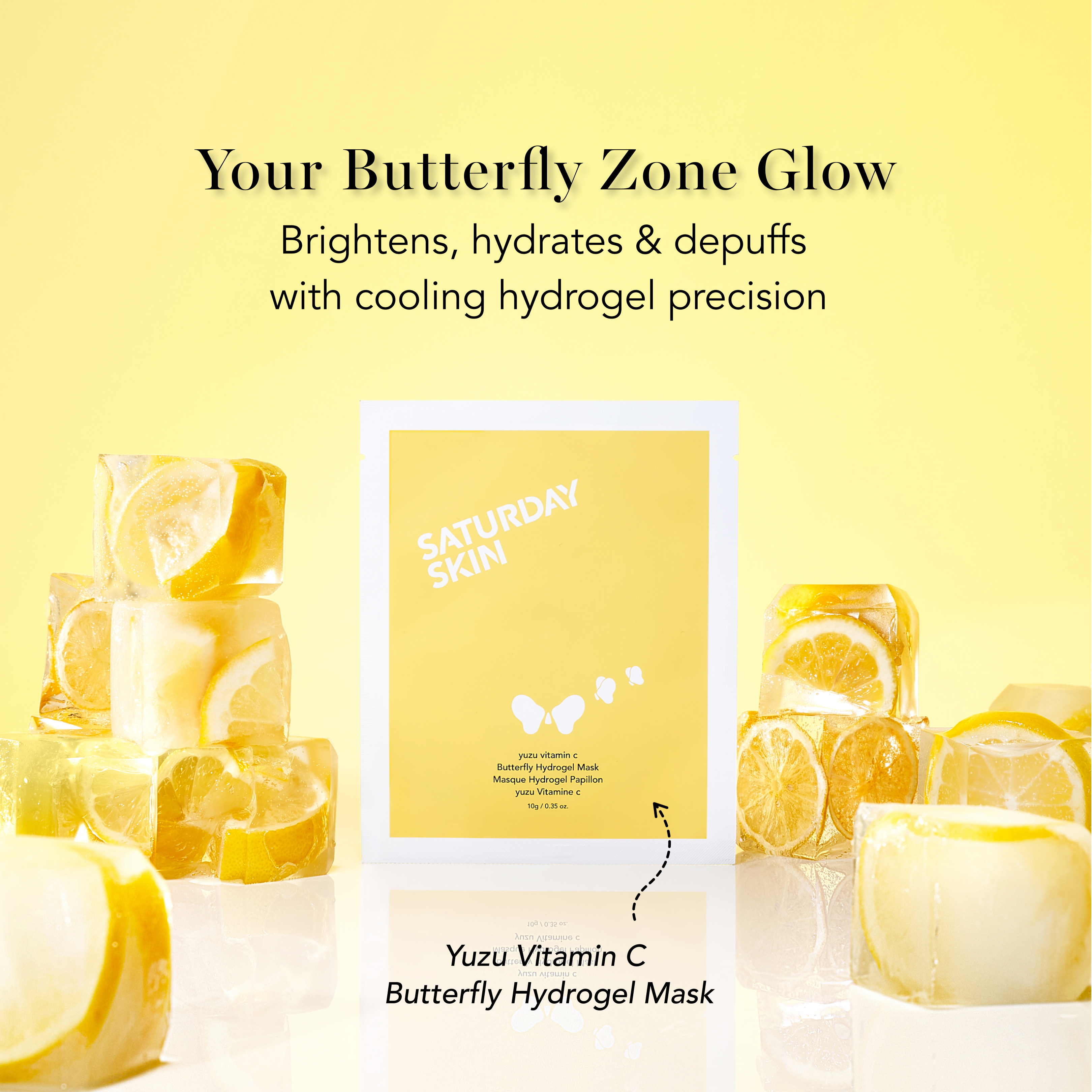 Saturday Skin Yuzu Vitamin C Butterfly Hydrogel Mask with lemon slices on a yellow background