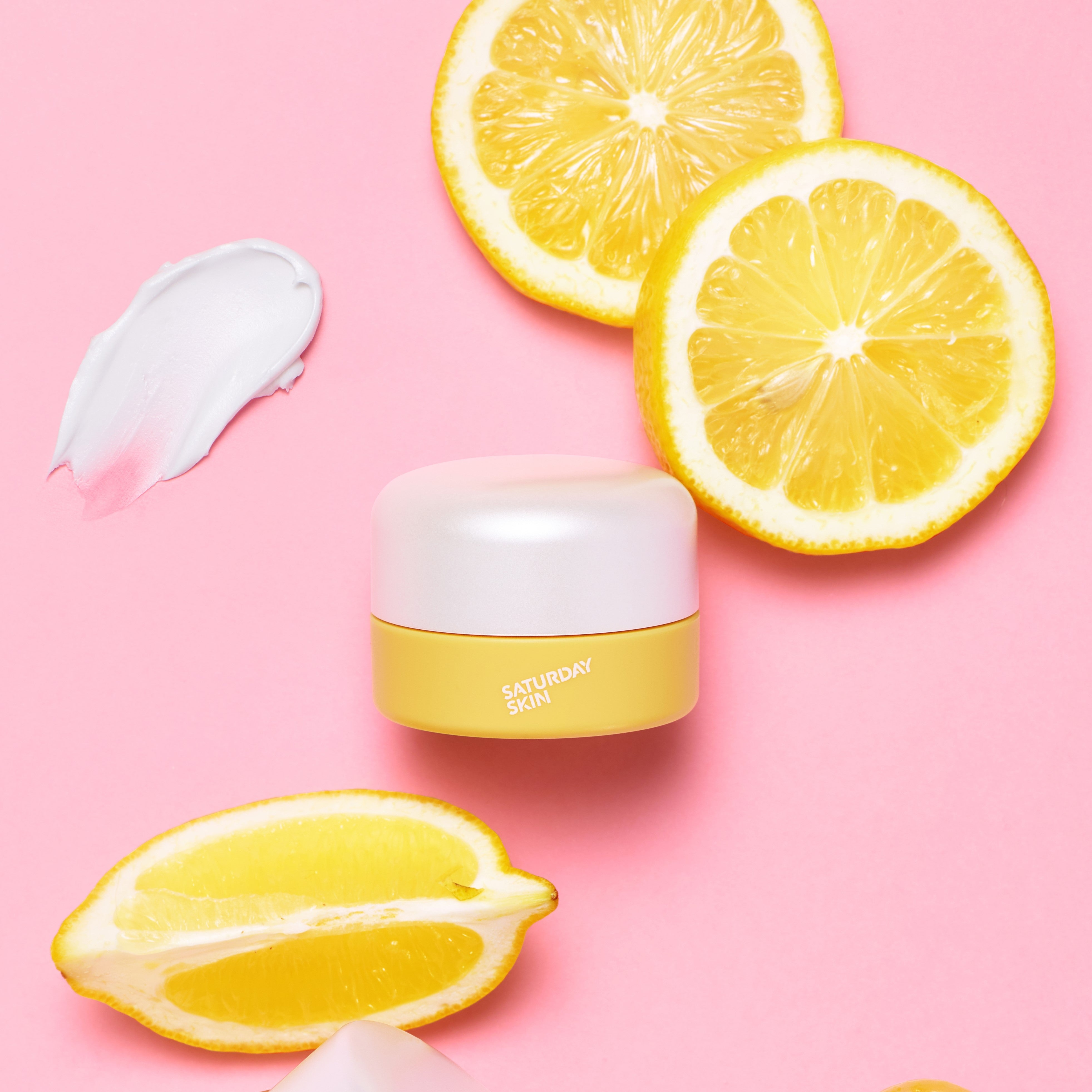 Yuzu Eye Cream pictured with lemons