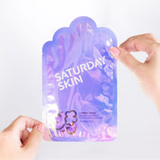 fingers holding product
