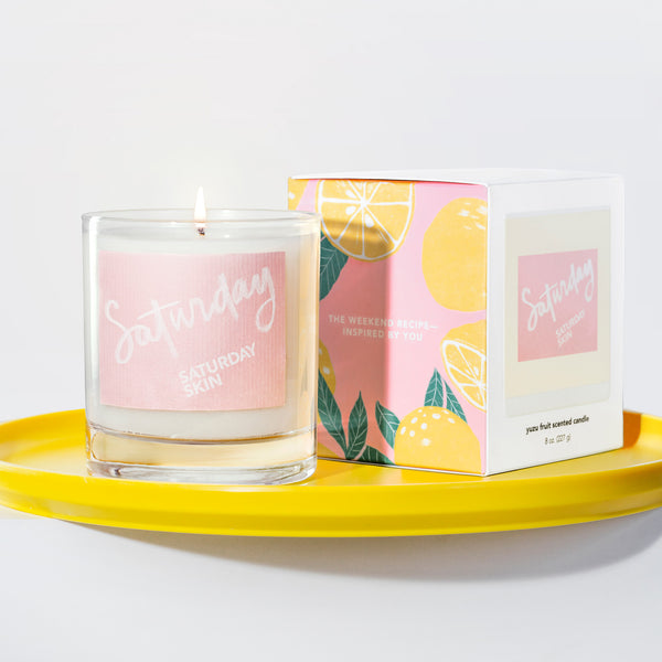 yuzu candle product with box on the yellow tray
